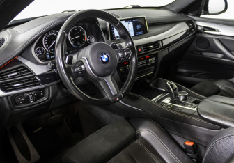 Подержанный автомобиль BMW X6 2018 года (10 фото)