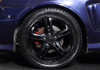 Подержанный автомобиль Hyundai Coupe 2002 года (21 фото)