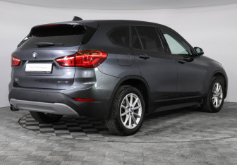 Подержанный автомобиль BMW X1 2018 года (2 фото)