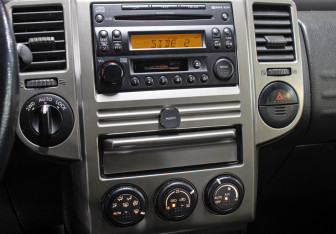 Подержанный автомобиль Nissan X-Trail 2005 года (18 фото)