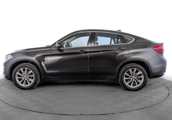 Подержанный автомобиль BMW X6 2018 года (8 фото)