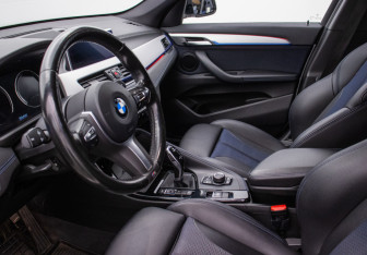 Подержанный автомобиль BMW X1 2021 года (10 фото)
