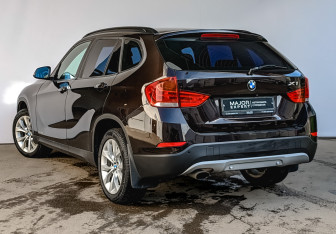 Подержанный автомобиль BMW X1 2014 года (7 фото)