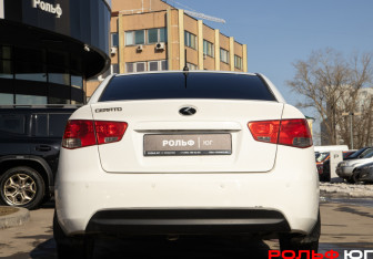 Подержанный автомобиль Kia Cerato Sedan 2011 года (22 фото)