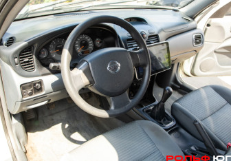 Подержанный автомобиль Nissan Almera Classic 2006 года (14 фото)