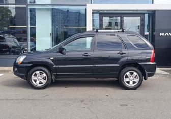 Подержанный автомобиль Kia Sportage 2010 года (8 фото)