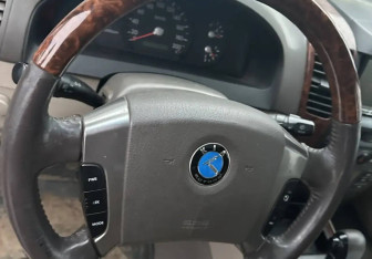 Подержанный автомобиль Kia Sorento 2002 года (25 фото)
