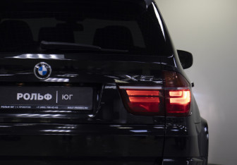 Подержанный автомобиль BMW X5 2009 года (23 фото)