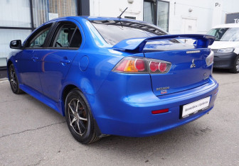 Подержанный автомобиль Mitsubishi Lancer Sedan 2011 года (7 фото)