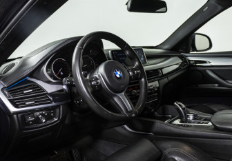 Подержанный автомобиль BMW X6 2017 года (10 фото)