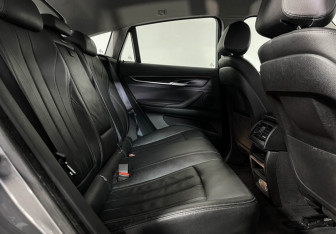Подержанный автомобиль BMW X6 2018 года (14 фото)