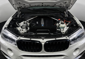 Подержанный автомобиль BMW X6 2018 года (10 фото)