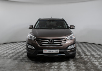 Подержанный автомобиль Hyundai Santa Fe 2015 года (2 фото)