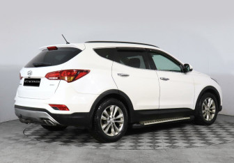 Подержанный автомобиль Hyundai Santa Fe 2016 года (3 фото)