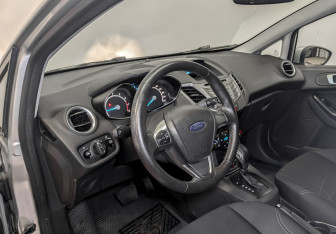 Подержанный автомобиль Ford Fiesta Sedan 2016 года (16 фото)