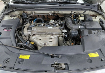 Подержанный автомобиль Toyota Avensis Sedan 2004 года (25 фото)