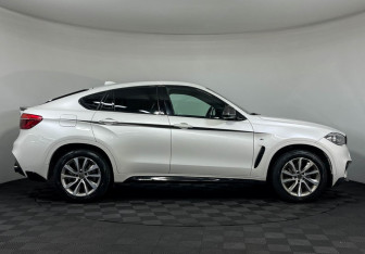 Подержанный автомобиль BMW X6 2019 года (6 фото)
