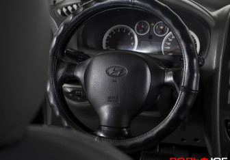 Подержанный автомобиль Hyundai Santa Fe 2010 года (13 фото)