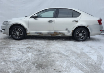 Подержанный автомобиль Skoda Octavia Liftback 2014 года (8 фото)