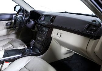 Подержанный автомобиль Kia Opirus 2009 года (9 фото)