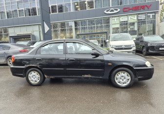 Подержанный автомобиль Kia Spectra Sedan 2006 года (4 фото)