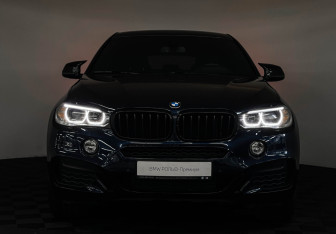 Подержанный автомобиль BMW X6 2018 года (21 фото)