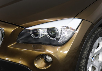 Подержанный автомобиль BMW X1 2009 года (7 фото)