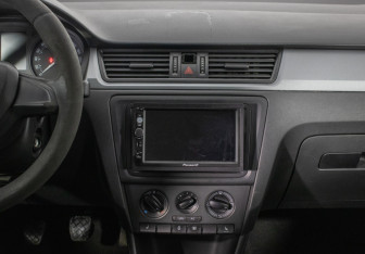 Подержанный автомобиль Skoda Rapid Liftback 2014 года (14 фото)