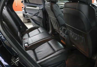 Подержанный автомобиль BMW X6 M 2013 года (13 фото)