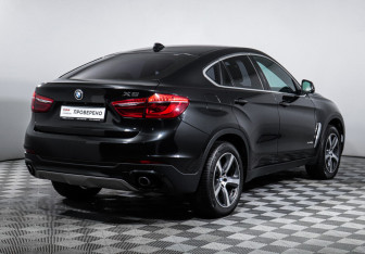 Подержанный автомобиль BMW X6 2016 года (5 фото)