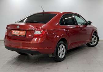 Подержанный автомобиль Skoda Rapid Liftback 2014 года (5 фото)