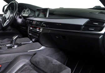 Подержанный автомобиль BMW X6 2016 года (10 фото)