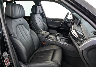 Подержанный автомобиль BMW X5 2015 года (24 фото)