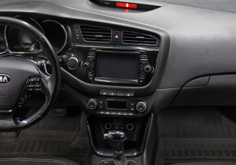 Подержанный автомобиль Kia Ceed Wagon 2014 года (15 фото)