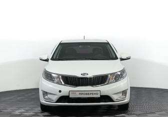 Подержанный автомобиль Kia Rio Hatchback 2013 года (2 фото)