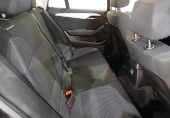 Подержанный автомобиль BMW X1 2013 года (10 фото)