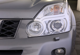 Подержанный автомобиль Nissan X-Trail 2010 года (12 фото)