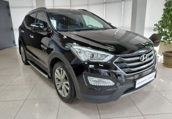 Подержанный автомобиль Hyundai Santa Fe 2014 года (3 фото)