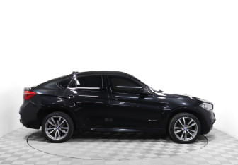 Подержанный автомобиль BMW X6 2015 года (4 фото)