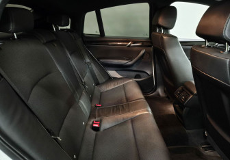 Подержанный автомобиль BMW X4 2016 года (13 фото)