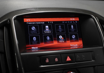 Подержанный автомобиль Opel Astra Hatchback 2014 года (20 фото)