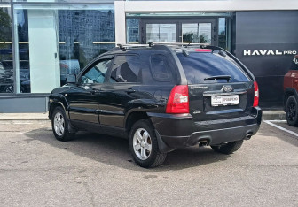Подержанный автомобиль Kia Sportage 2010 года (7 фото)