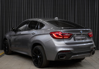Подержанный автомобиль BMW X6 2014 года (7 фото)