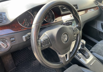 Подержанный автомобиль Volkswagen Passat CC 2010 года (14 фото)