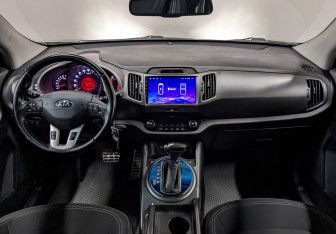 Подержанный автомобиль Kia Sportage 2013 года (14 фото)