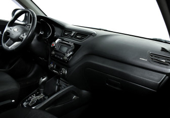 Подержанный автомобиль Kia Rio Sedan 2013 года (7 фото)