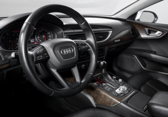 Подержанный автомобиль Audi A7 2014 года (14 фото)