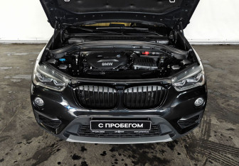 Подержанный автомобиль BMW X1 2015 года (9 фото)