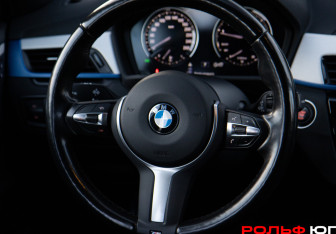 Подержанный автомобиль BMW X1 2018 года (12 фото)