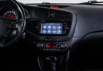 Подержанный автомобиль Kia Ceed Wagon 2015 года (14 фото)